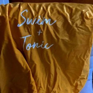 This is a gold swim suit